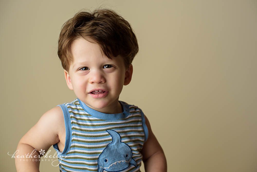 toddler boy with tan background for studio photography session
