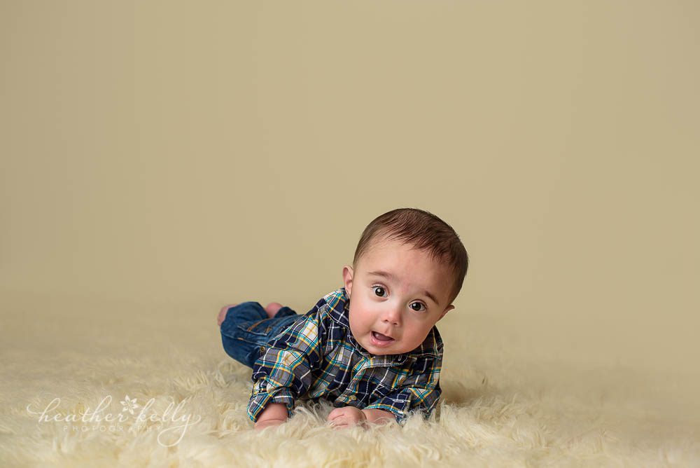 6 month boy doing tummy time