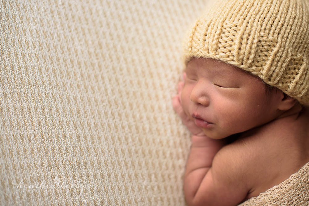 close up of newborn boy photo