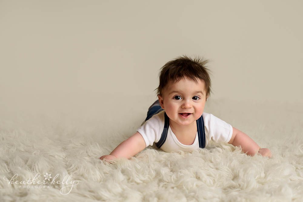happy 6 month baby boy on cream rug photo monroe baby photos ct photographer
