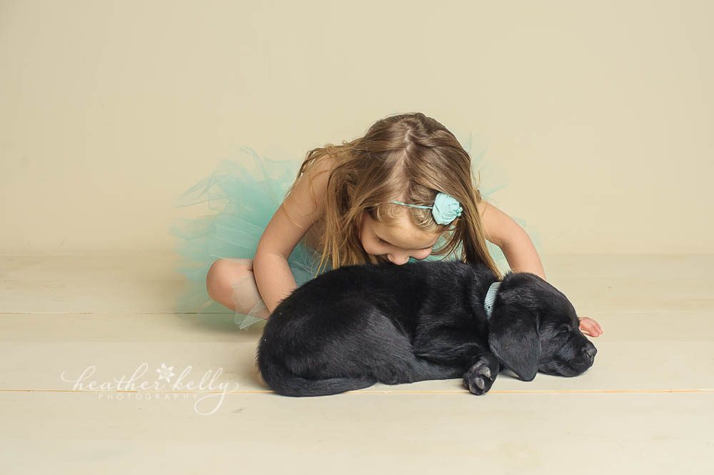 Little girl kissing lab puppy photo. Newborn puppy photo session. Fairfield County CT. 