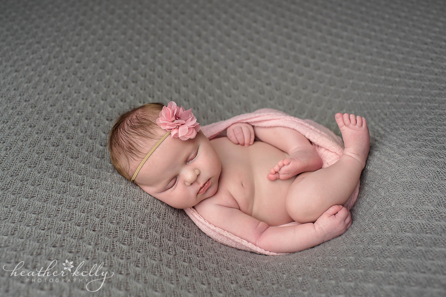 pink wrap and newborn girl. newborn photography poses