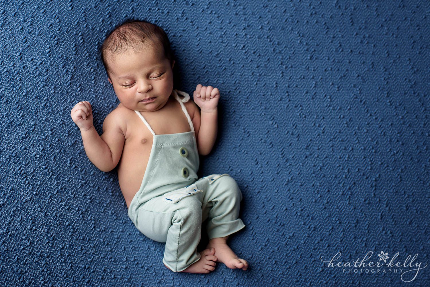 baby boy on back newborn photography poses. cute boy romper!