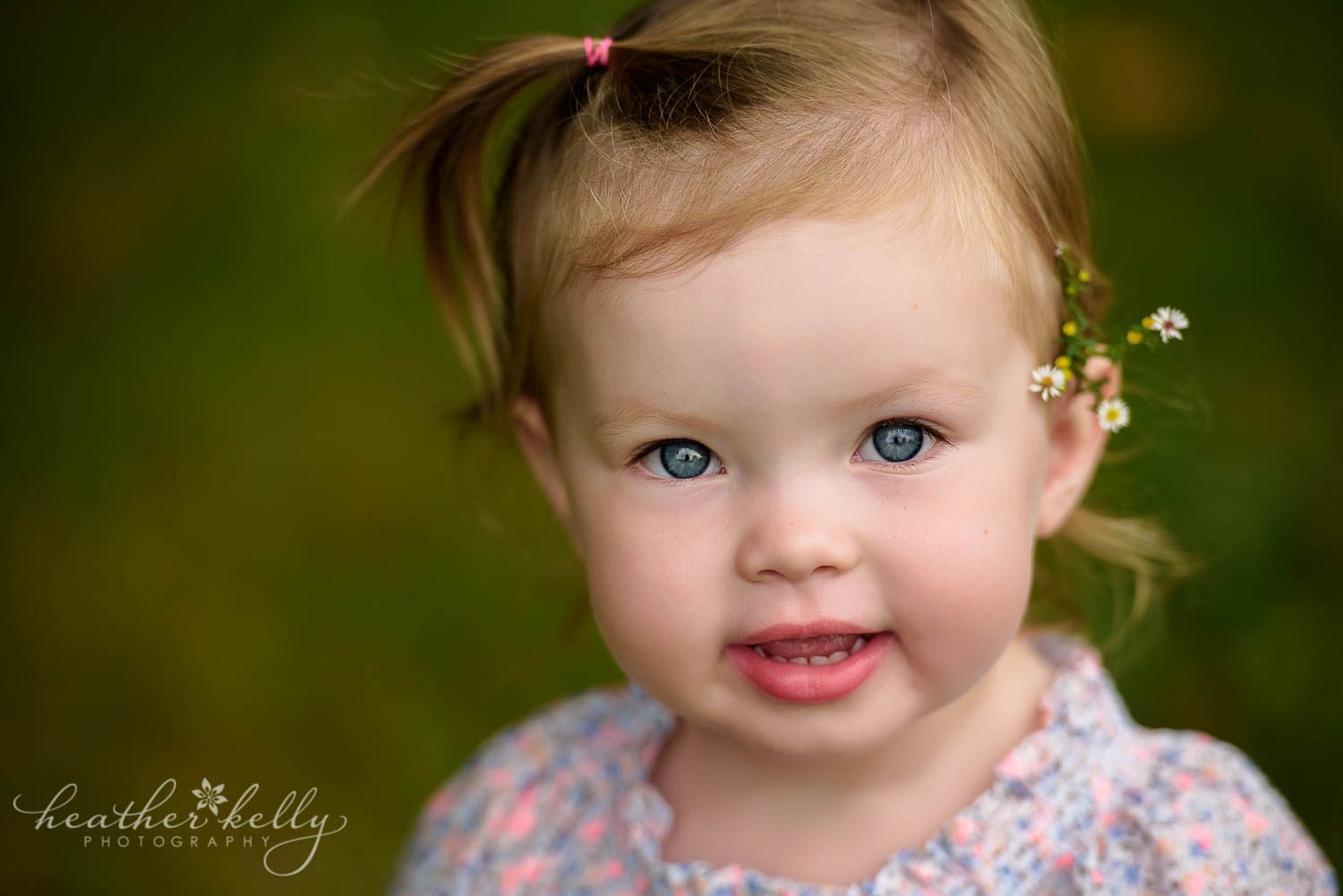 two year old with flower in her hair. berlin ct child photography