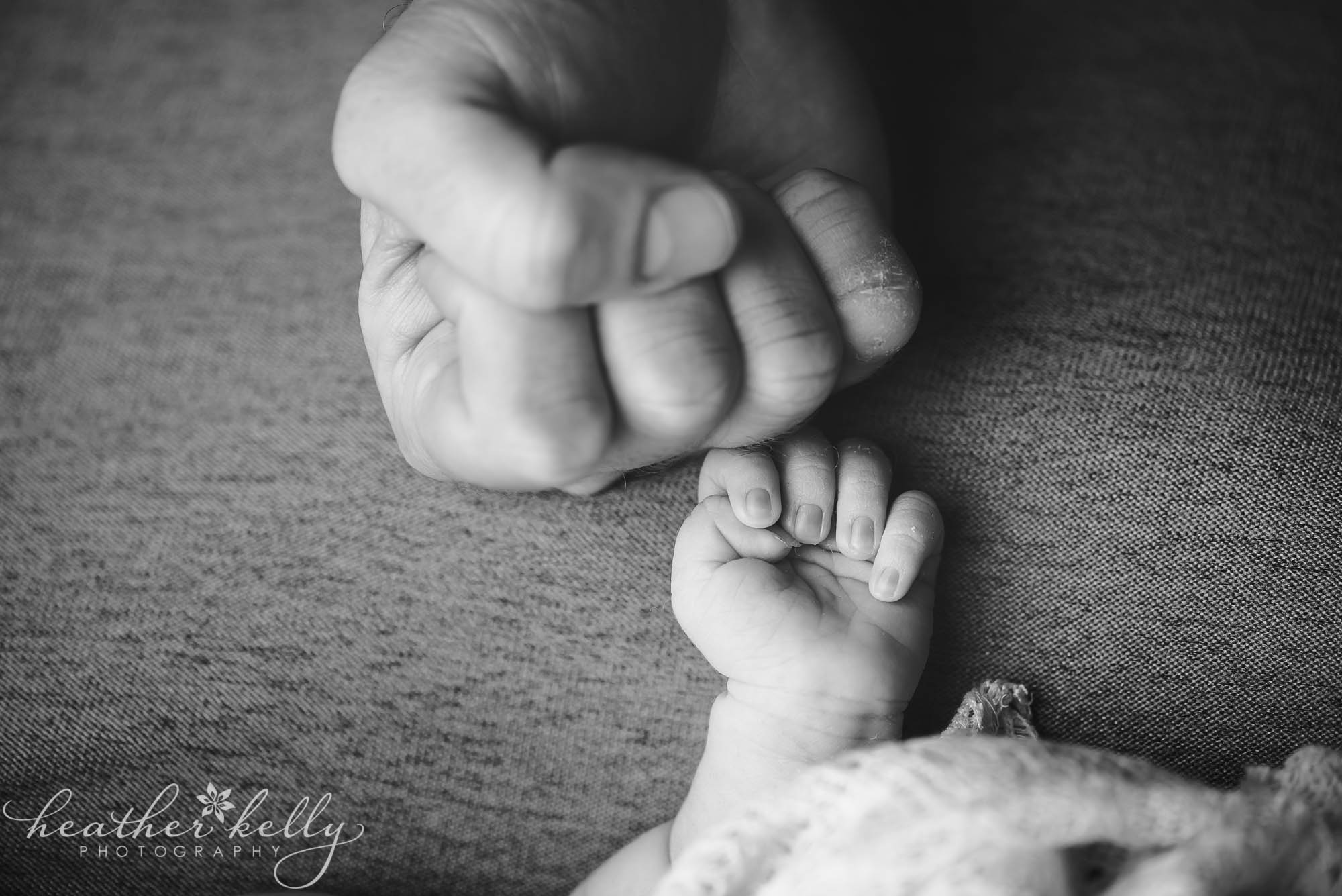 newborn and dad fist bump. ridgefield ct newborn photography