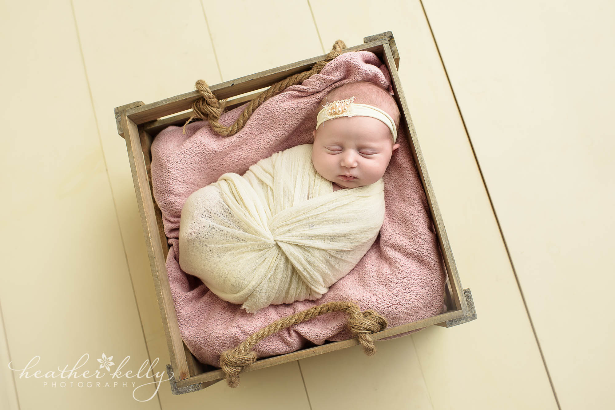 baby girl in crate pink. newtown newborn girl. ct photography