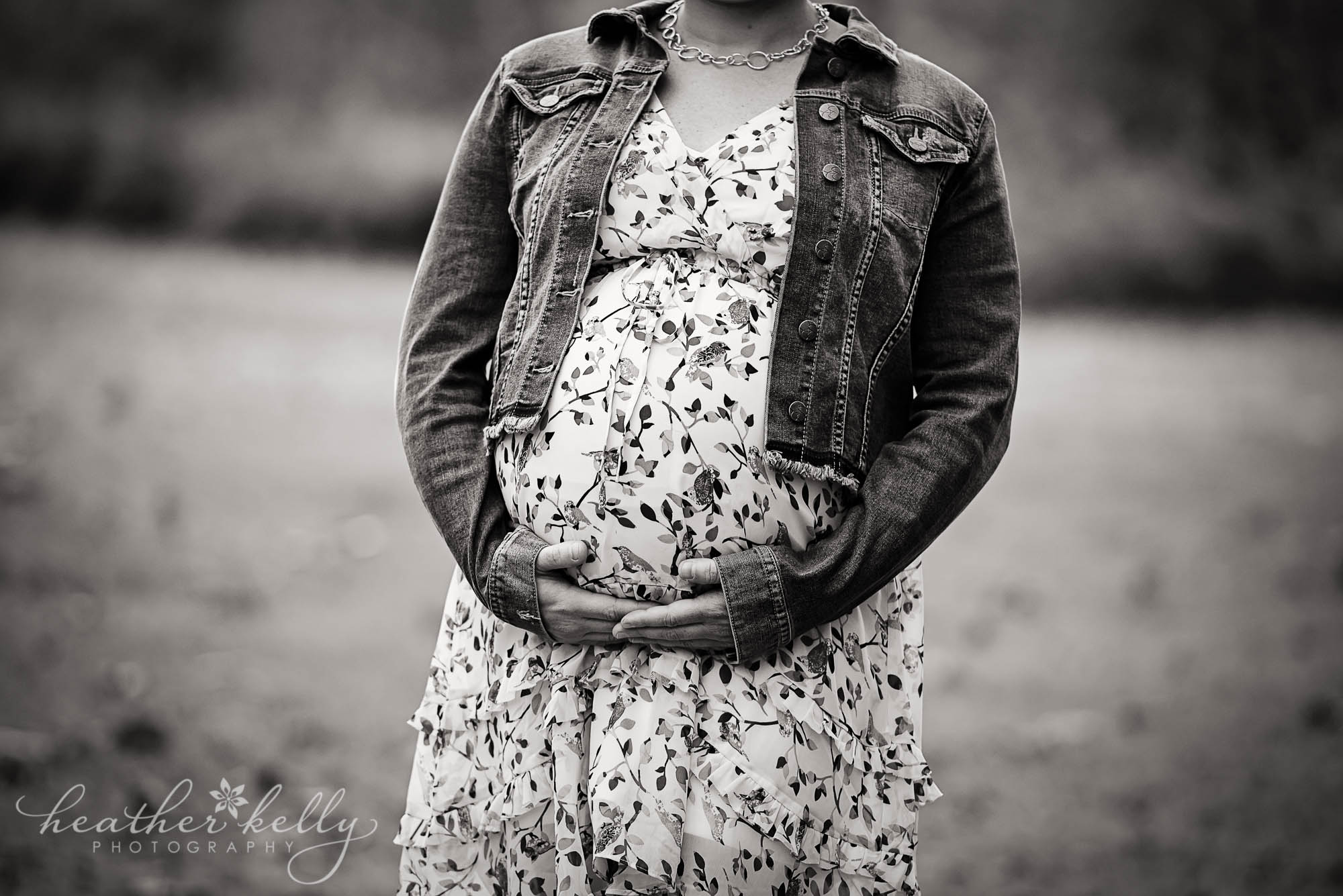 black and white maternity image in park. new milford maternity family