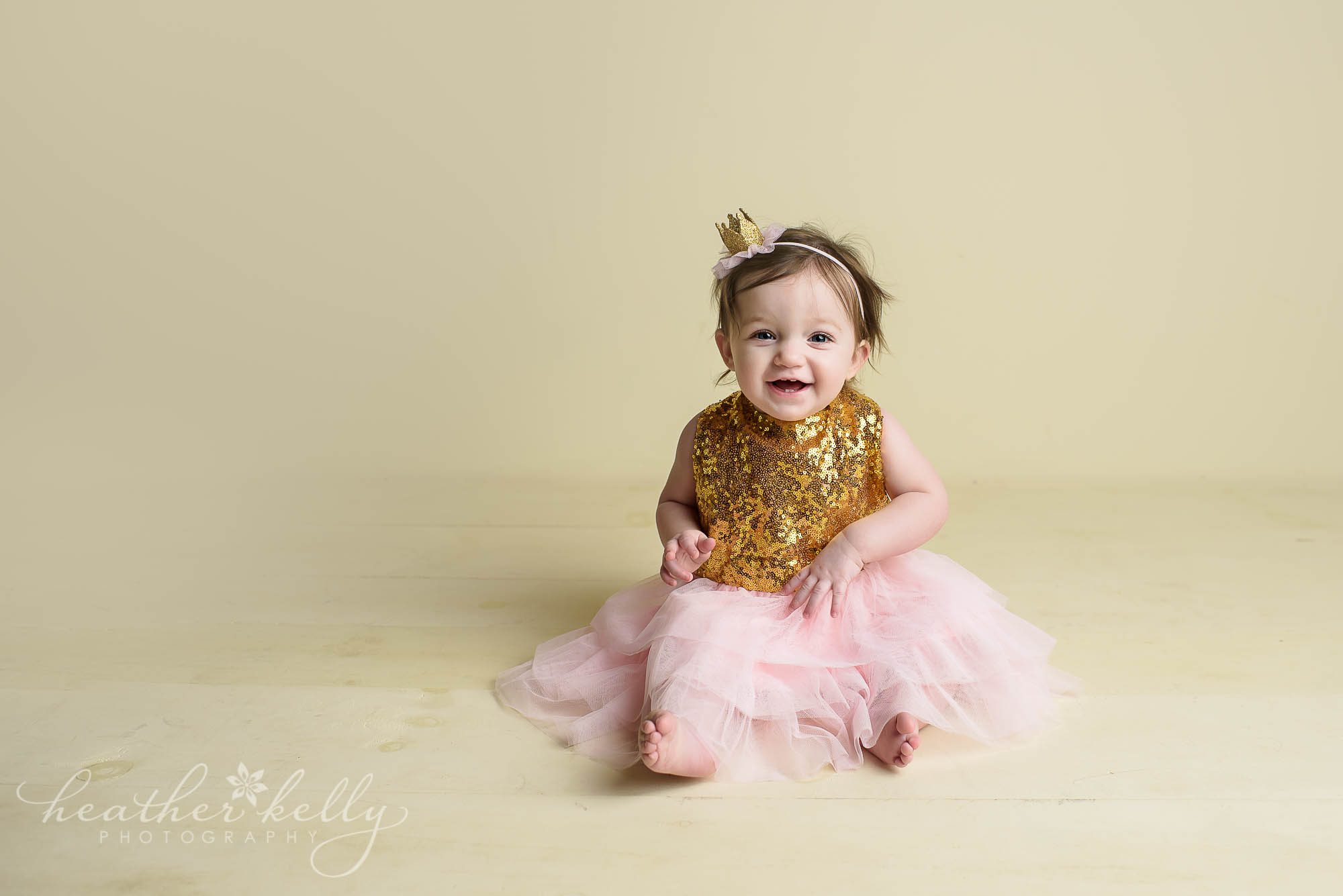 pink and gold first birthday cake smash