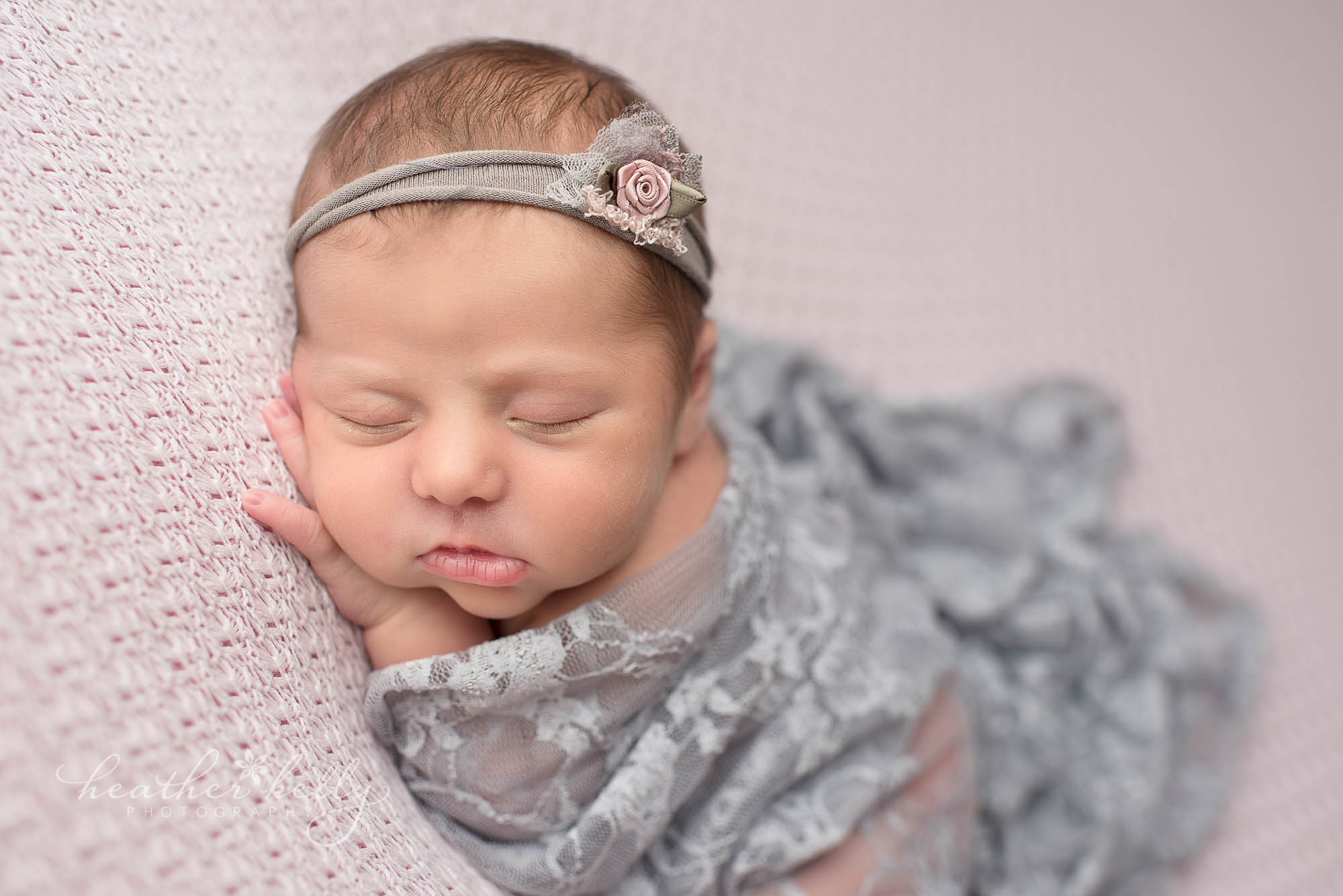 pink and gray newborn photography set up.