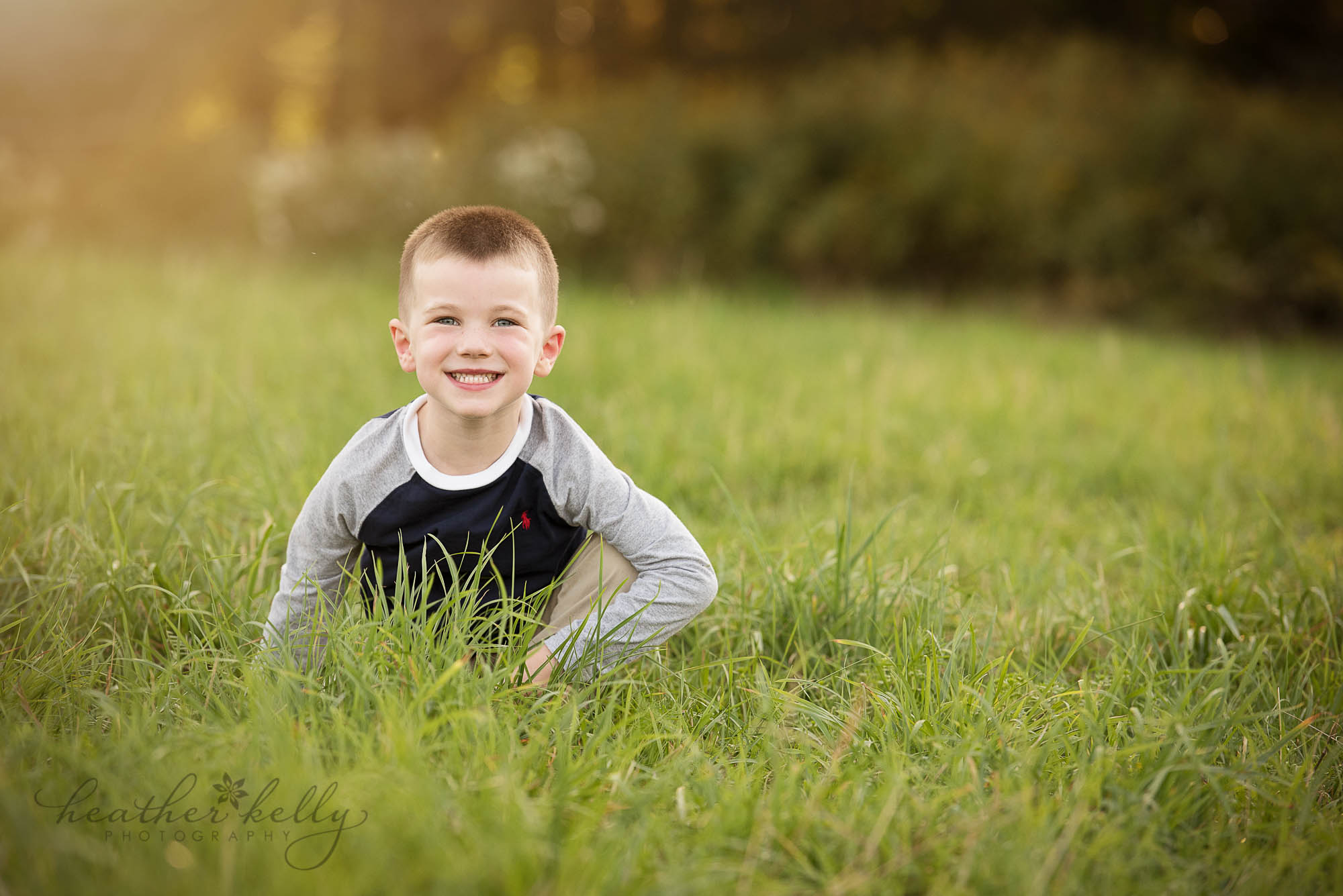 boy in grass ct family photography