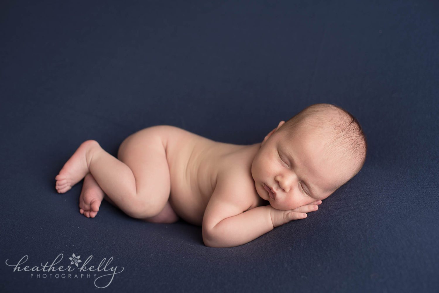 sleeping newborn boy on blue. newborn photography ct