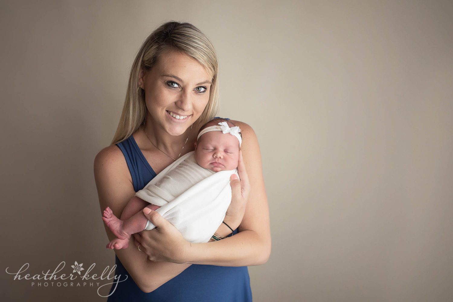 shelton newborn photography. mom posed with her newborn girl. 