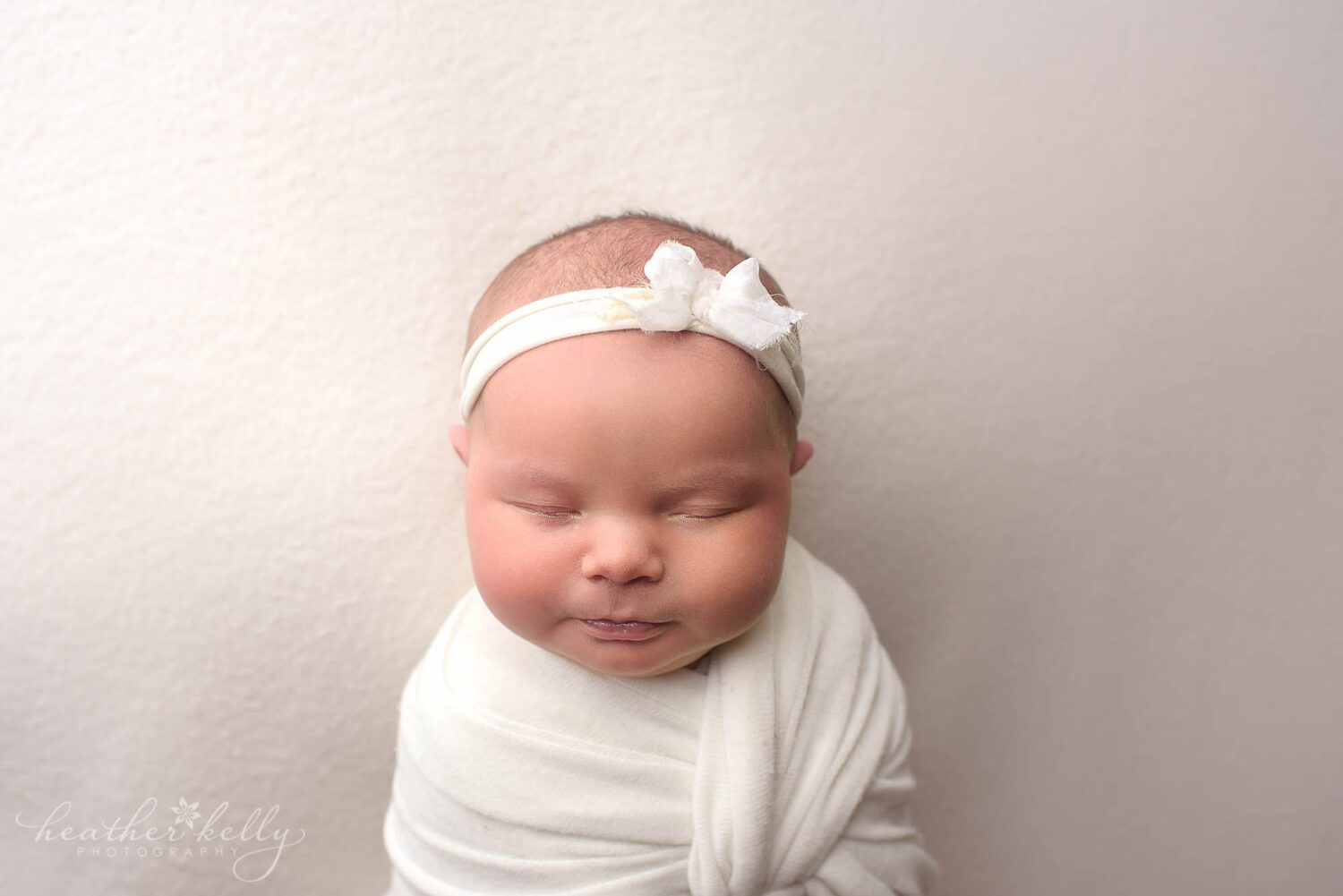new fairfield newborn photography. newborn girl in white