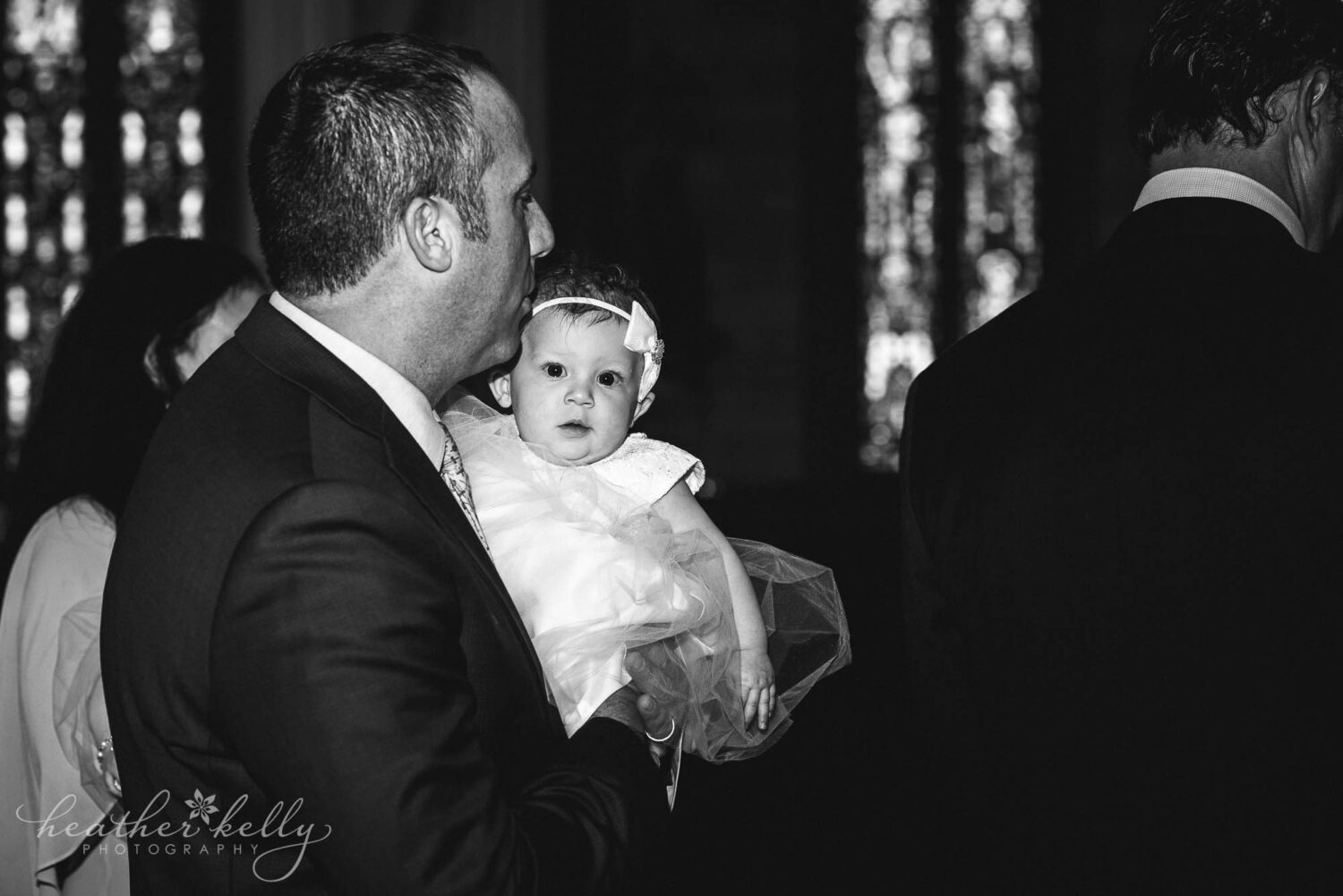 dad holding his daughter for her baptism in wallingford ct