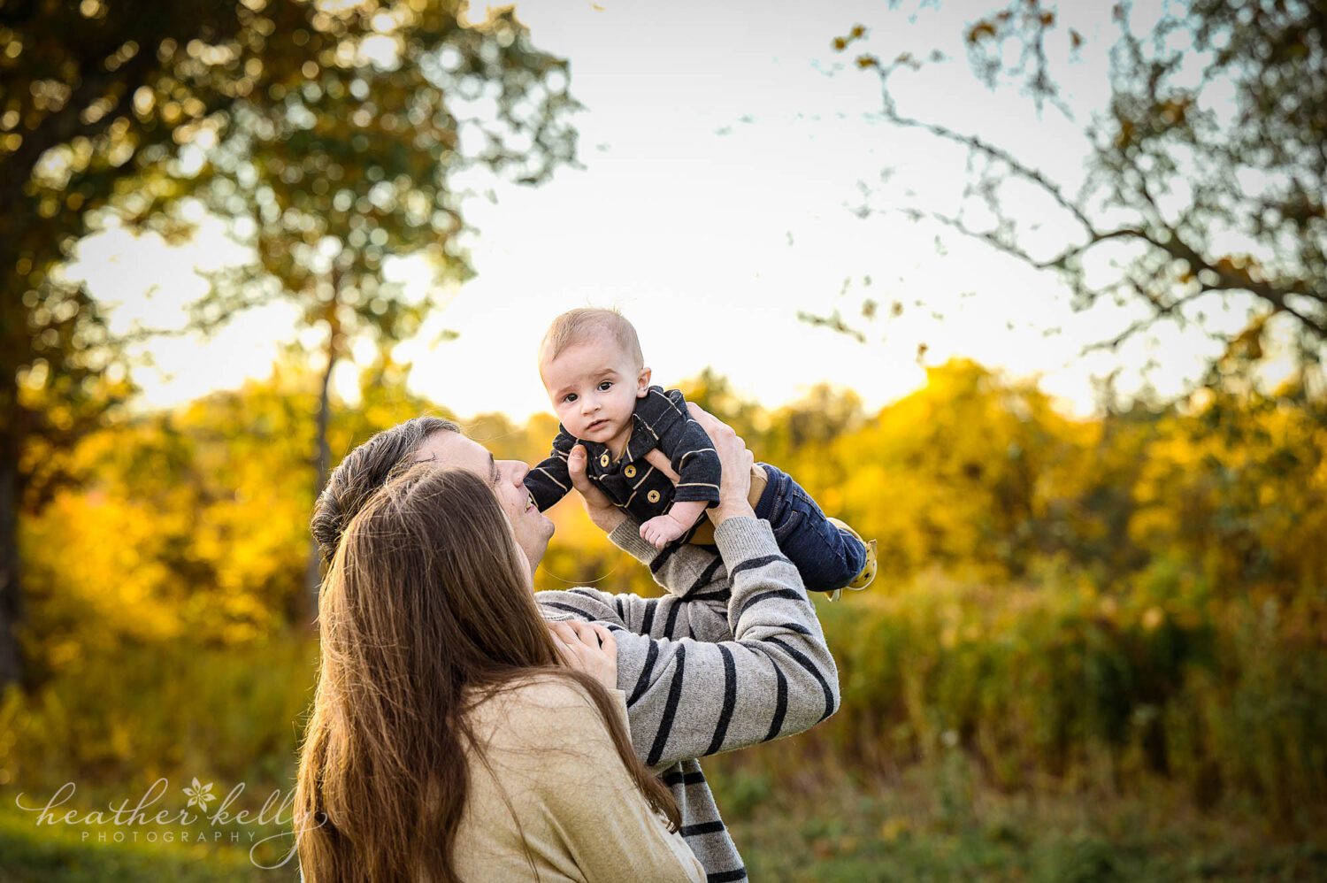 ct fall photography. A family of 3 with their 5 month old son. 