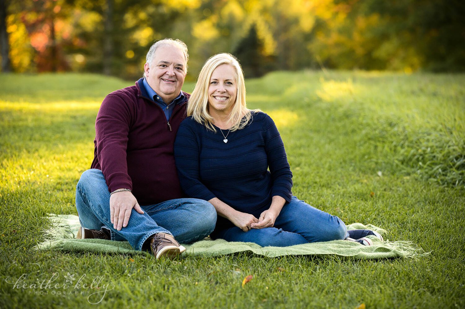 mom and dad enjoy a moment by themselves during their sandy hook ct family photography session. 