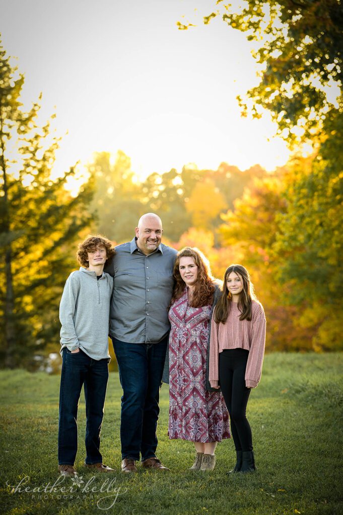 a family of 4 during a sunet photography session 